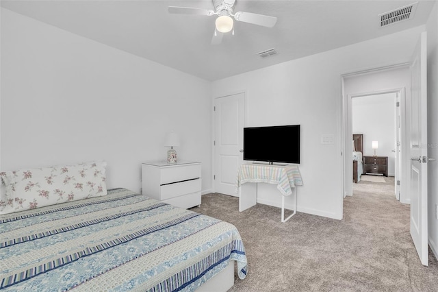 bedroom with a ceiling fan, carpet, visible vents, and baseboards