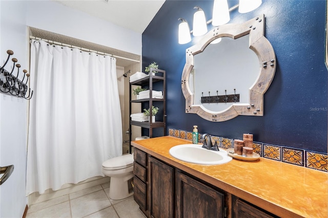 full bathroom with tile patterned flooring, toilet, vanity, and shower / bath combo