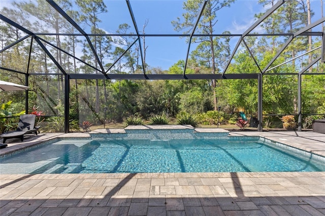 pool featuring a patio area and a lanai