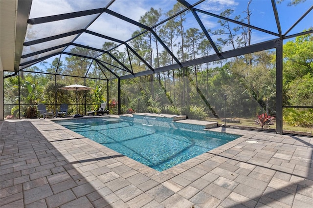 pool featuring a lanai and a patio