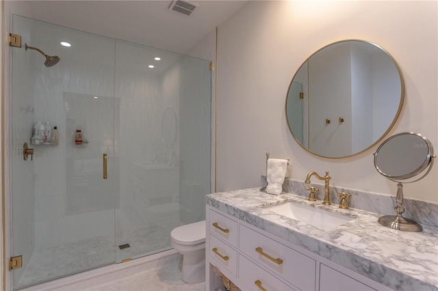 bathroom with visible vents, toilet, and a stall shower