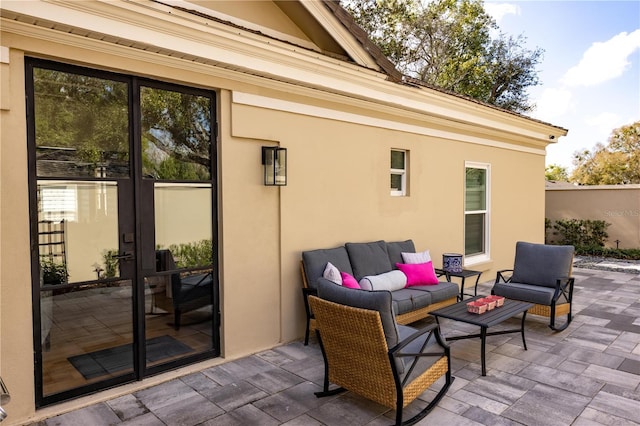 view of patio featuring an outdoor hangout area and french doors