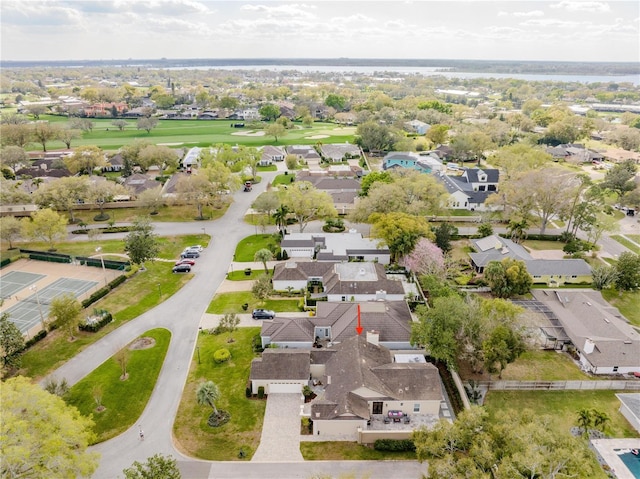 drone / aerial view featuring a residential view and view of golf course