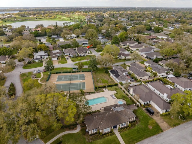 bird's eye view featuring a residential view and a water view