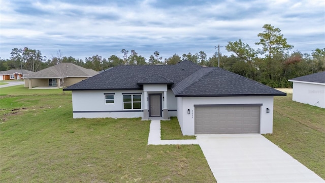 view of front of house with a garage, driveway, roof with shingles, stucco siding, and a front yard