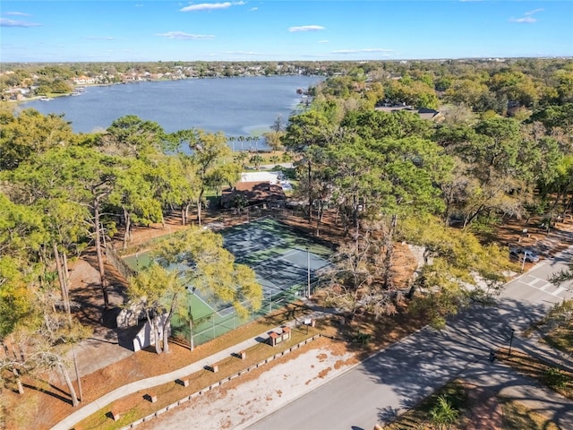 aerial view featuring a view of trees and a water view