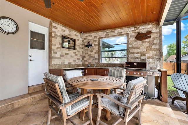 view of patio featuring a grill