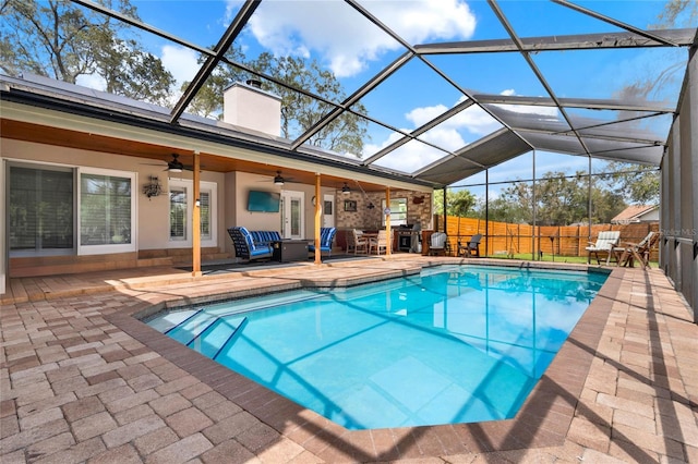 view of swimming pool with a ceiling fan, a patio, fence, french doors, and a fenced in pool