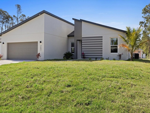 view of front of home featuring cooling unit, an attached garage, a front lawn, and stucco siding