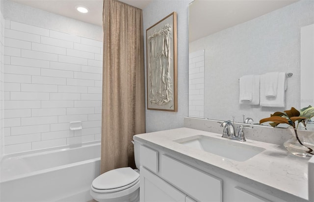 full bathroom featuring shower / tub combo with curtain, vanity, and toilet