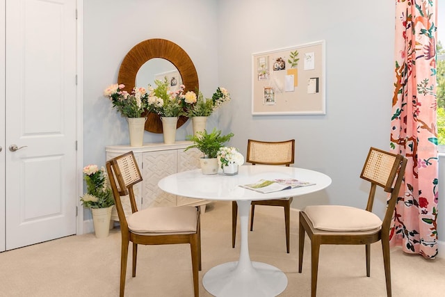 dining room with carpet flooring