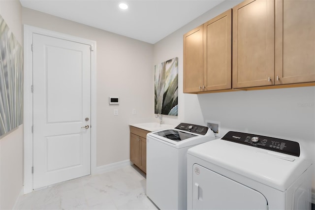 laundry room with cabinet space, baseboards, marble finish floor, separate washer and dryer, and recessed lighting