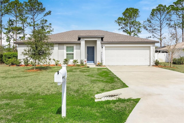 view of front facade featuring an attached garage, concrete driveway, roof with shingles, stucco siding, and a front yard