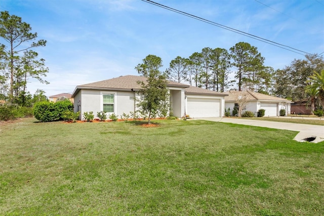 view of front of house with a garage, a front lawn, concrete driveway, and stucco siding