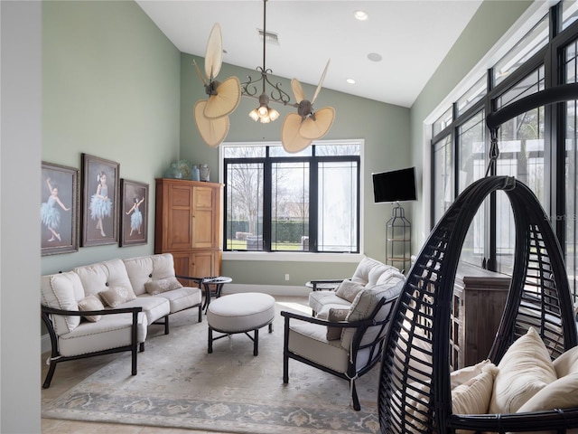 living room with a chandelier, high vaulted ceiling, visible vents, and recessed lighting