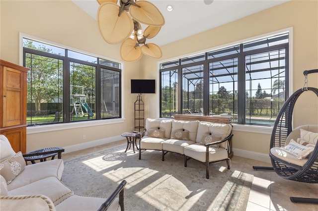 12860 Jacob Grace Ct, Windermere, FL 34786 - living area featuring light tile patterned flooring, baseboards, and ceiling fan