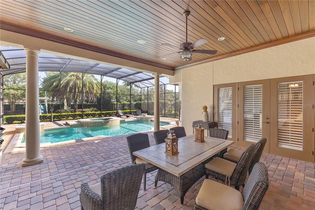 12860 Jacob Grace Ct, Windermere, FL 34786 - view of pool featuring french doors, a patio, a pool with connected hot tub, ceiling fan, and glass enclosure