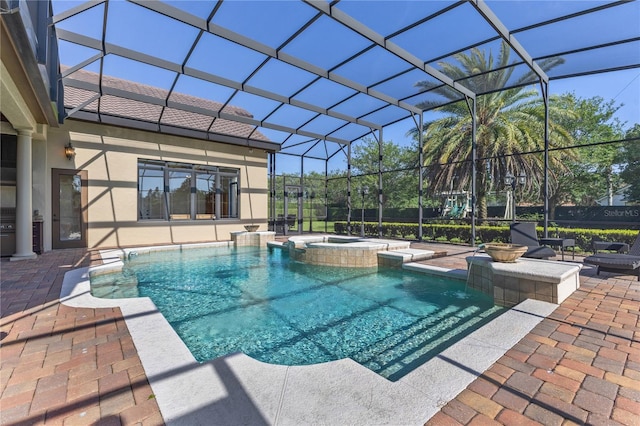 12860 Jacob Grace Ct, Windermere, FL 34786 - view of pool featuring a patio area, a lanai, and a pool with connected hot tub