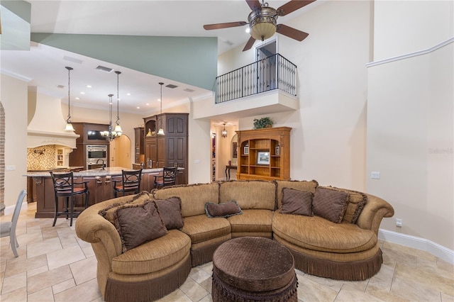 12860 Jacob Grace Ct, Windermere, FL 34786 - living area featuring a ceiling fan, high vaulted ceiling, a chandelier, and baseboards