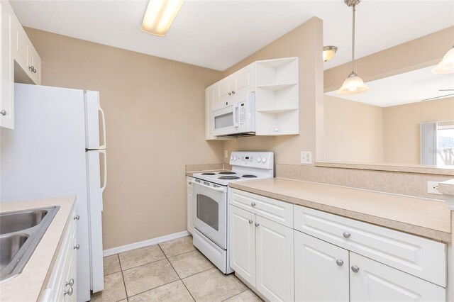 kitchen featuring open shelves, light countertops, white cabinetry, a sink, and white appliances