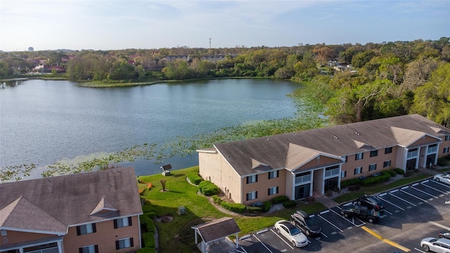 birds eye view of property featuring a water view