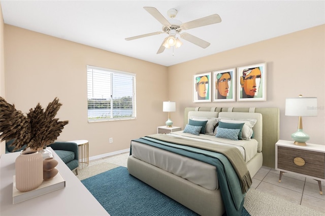 bedroom with baseboards and ceiling fan