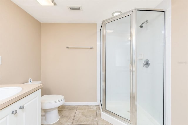 bathroom featuring a shower stall, vanity, visible vents, and toilet