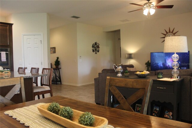 4110 Arlington Ridge Blvd, Leesburg, FL 34748 - living room with a ceiling fan and baseboards