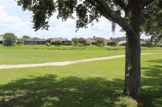 4110 Arlington Ridge Blvd, Leesburg, FL 34748 - surrounding community featuring a lawn and a residential view