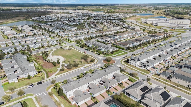 aerial view with a water view and a residential view