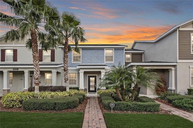 view of property featuring stucco siding