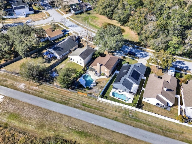 birds eye view of property with a residential view