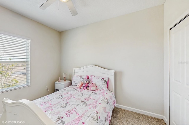 bedroom with carpet, baseboards, and ceiling fan