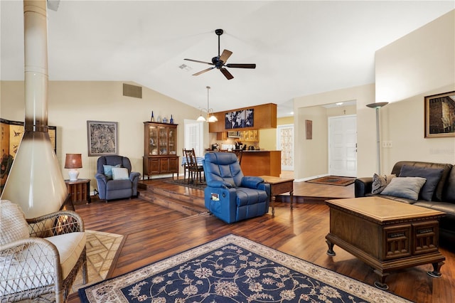 living room with visible vents, a ceiling fan, lofted ceiling, and wood finished floors