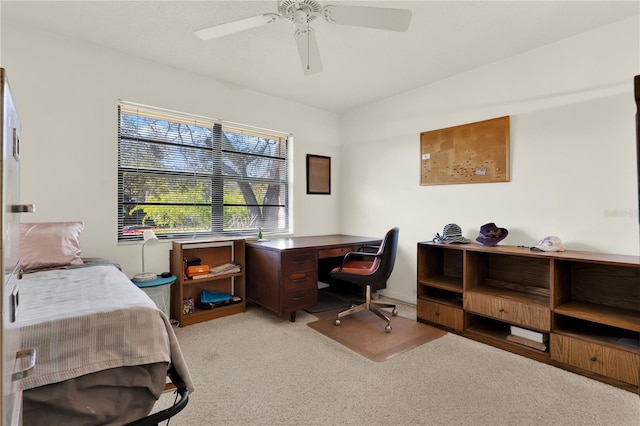 bedroom with a ceiling fan and light carpet