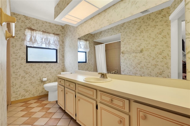 bathroom featuring wallpapered walls, baseboards, toilet, a shower with shower curtain, and vanity