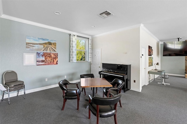 dining area featuring ornamental molding, carpet flooring, visible vents, and baseboards