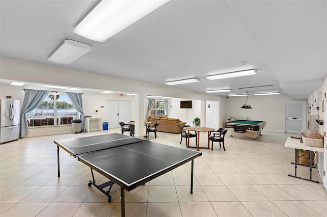 rec room featuring light tile patterned floors and billiards