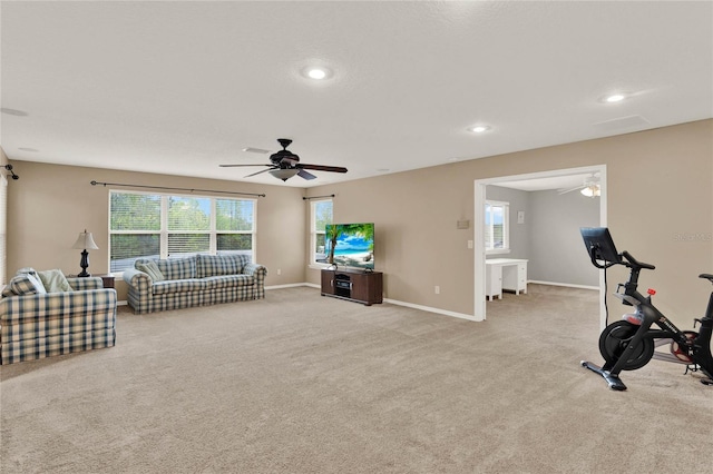 carpeted living room with ceiling fan, recessed lighting, and baseboards