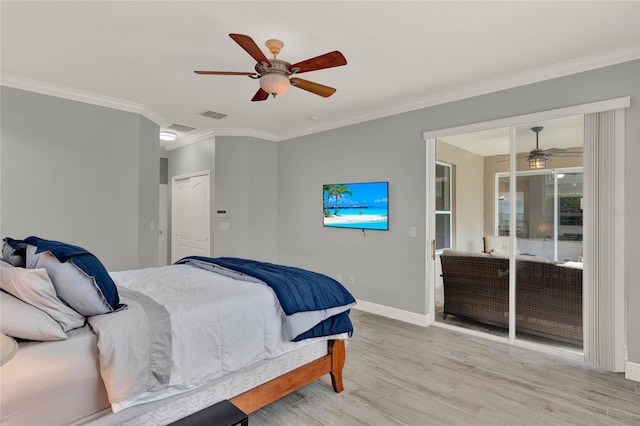 bedroom featuring visible vents, ornamental molding, ceiling fan, wood finished floors, and baseboards