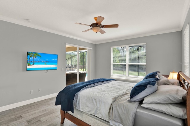 bedroom featuring crown molding, access to outside, wood finished floors, and baseboards