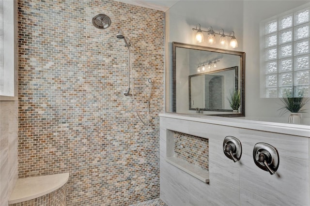 full bathroom featuring a tile shower