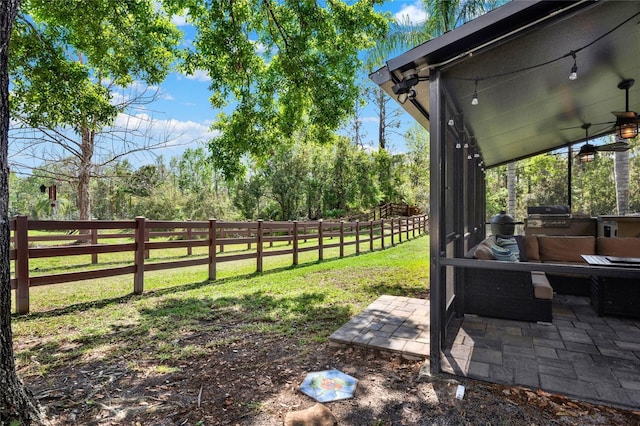 view of yard with a patio area and a fenced backyard