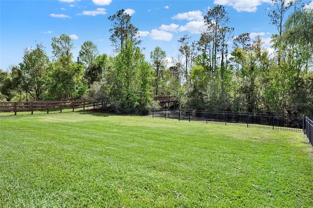 view of yard with fence