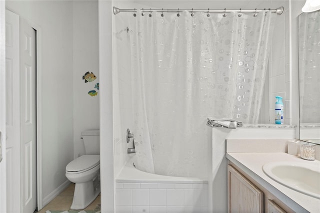 bathroom with tile patterned floors, toilet, vanity, and shower / bath combination with curtain