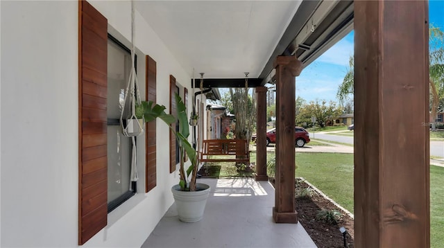 view of patio featuring a porch