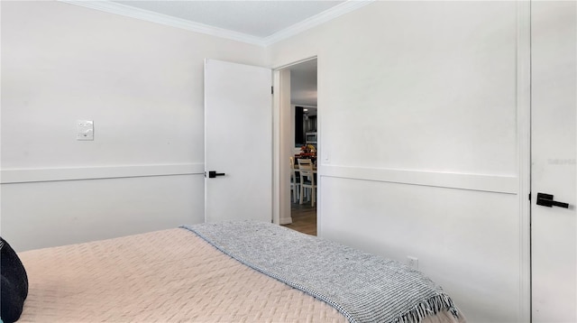 bedroom with crown molding