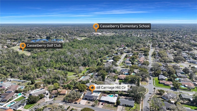 birds eye view of property with a water view and a residential view