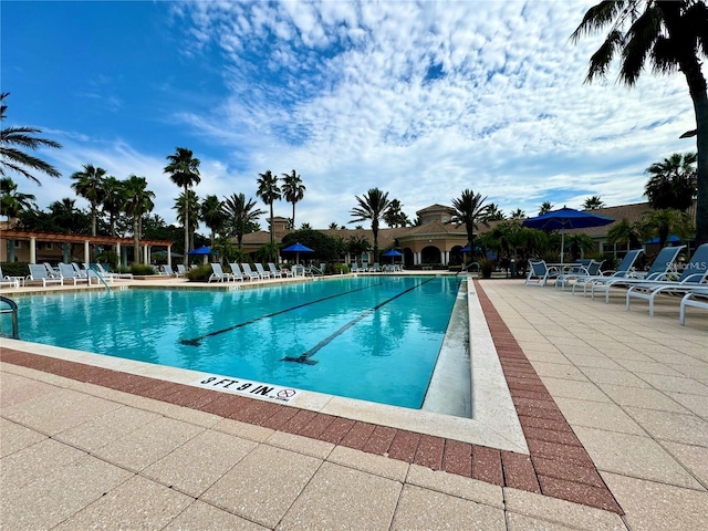 pool with a patio