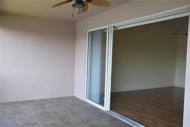 balcony with a ceiling fan and a patio area